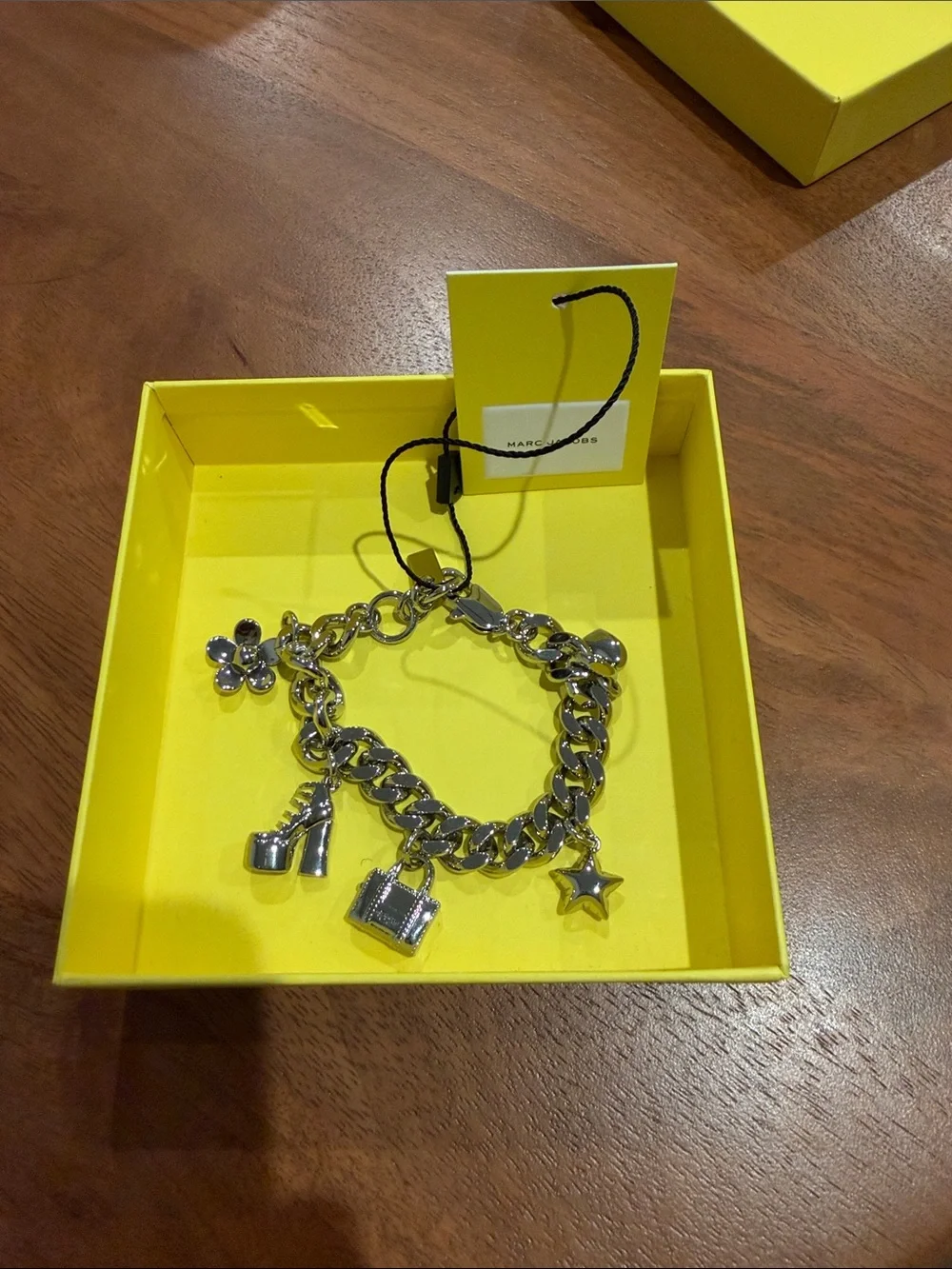 The Mini Icon Charm Bracelet with Star, Shoe & Flower Charms from Marc Jacobs